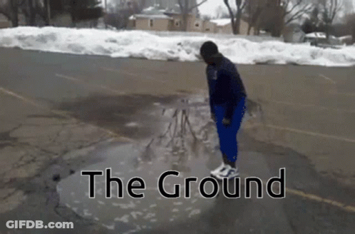 Person Standing In Water Puddle With Ground Text GIF