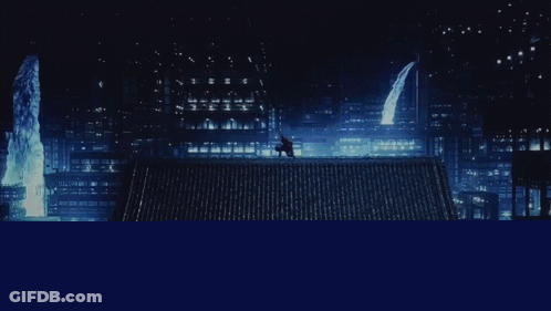 Person Standing On Building Roof With Glowing Circle GIF