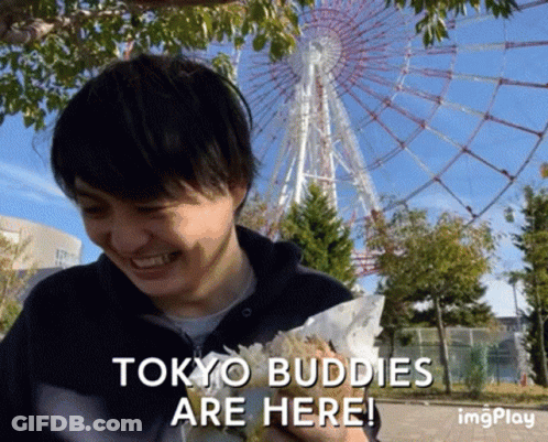 Person Standing On Sidewalk By Fence With AE Sign GIF