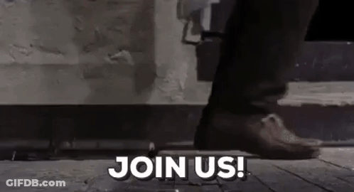 Person Standing On Sidewalk Saying Join Us GIF