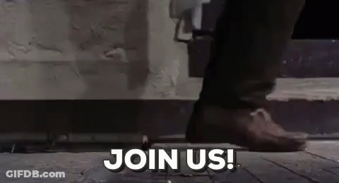 Person Standing On Sidewalk Saying Join Us GIF