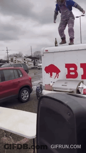 Person Standing On White Buffalo Truck GIF