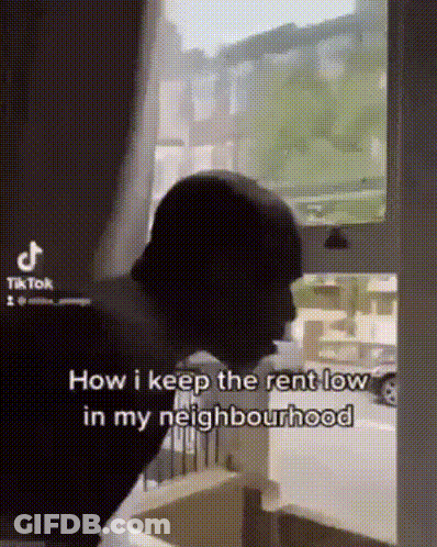 Person Standing With Head In Hands GIF