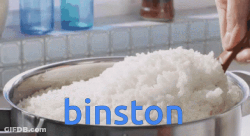 Person Stirring Rice In Pot With Binston In Blue Letters GIF