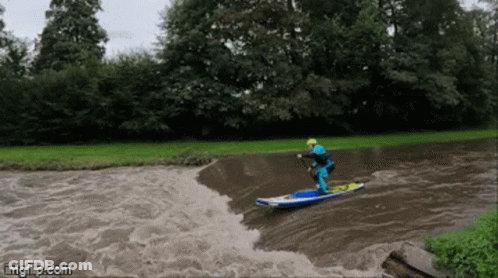 Person Surfing In River GIF