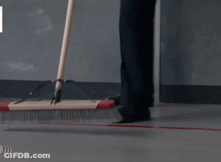 Person Sweeping Floor With Broom GIF