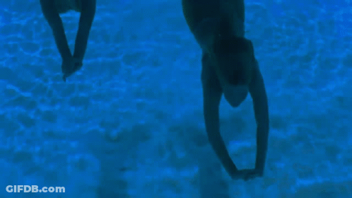 Person Swimming In Dark Pool GIF