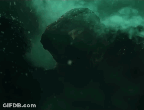 Person Swimming With Hood GIF