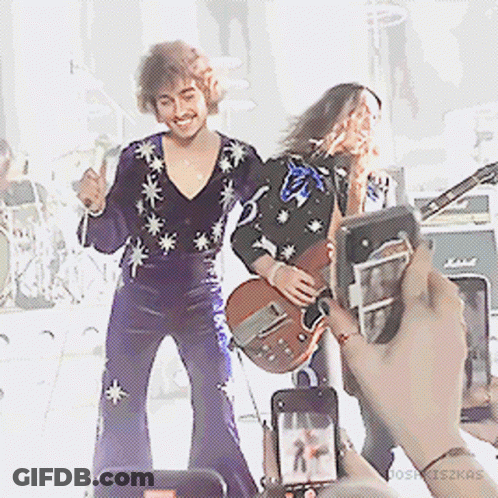 Person Taking Picture Of Josh Playing Guitar GIF