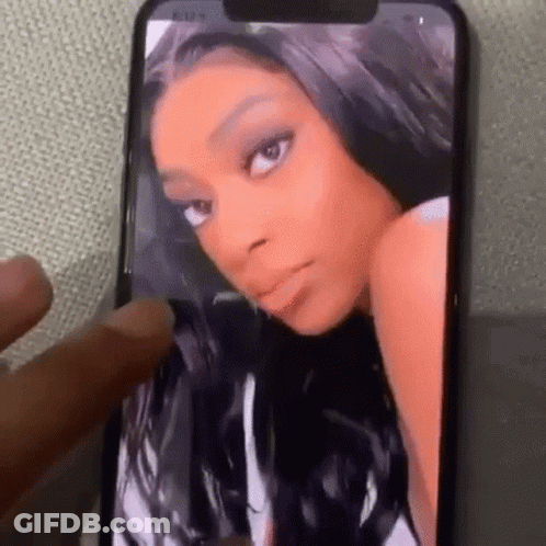 Person Taking Picture Of Woman On Cell Phone GIF