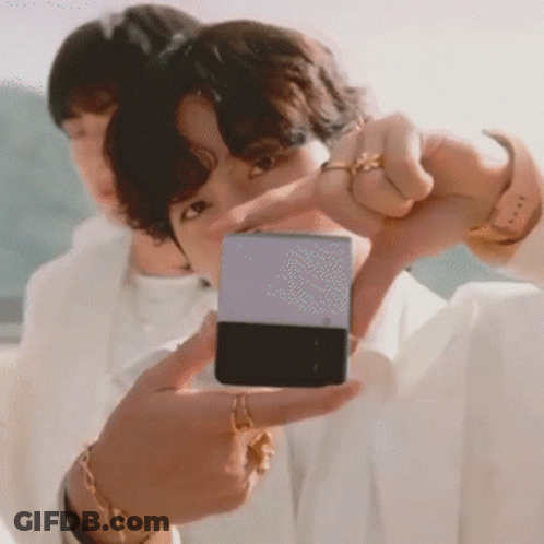 Person Taking Picture With Cell Phone GIF