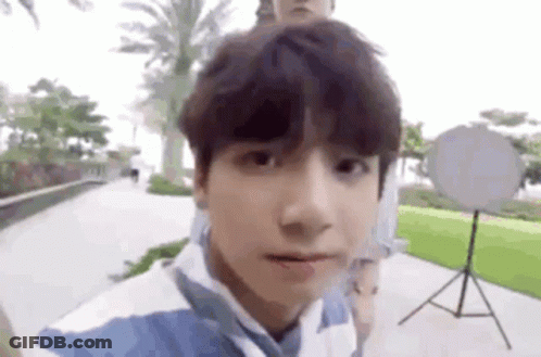 Person Taking Selfie In Front Of Camera GIF