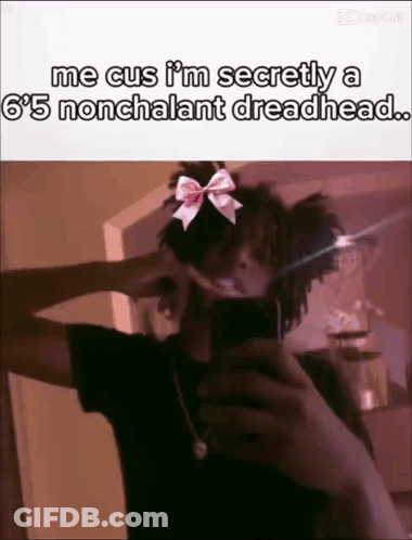 Person Taking Selfie With Bow On Head GIF