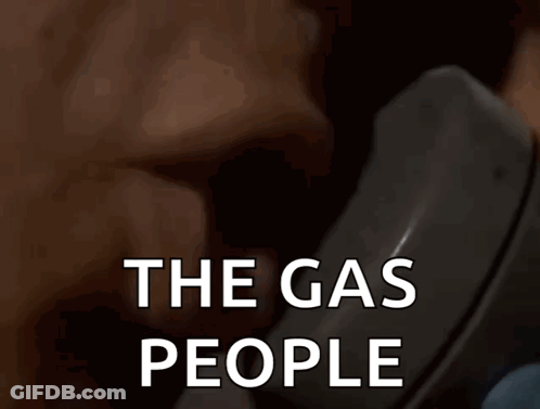 Person Talking On Phone Saying The Gas People GIF
