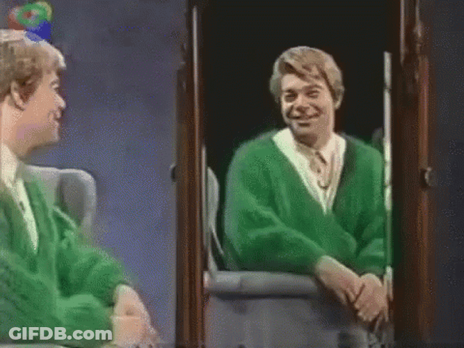 Person Talking To His Self In Mirror GIF