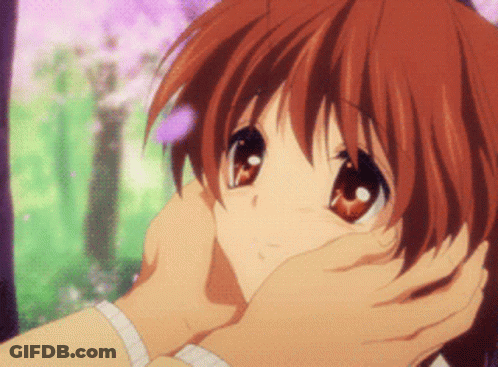 Person Touching Girl's Face GIF