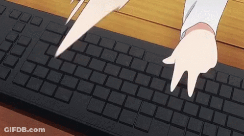 Person Typing On Black Keyboard GIF