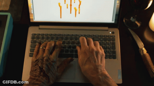 Person Typing On Lenovo Laptop GIF