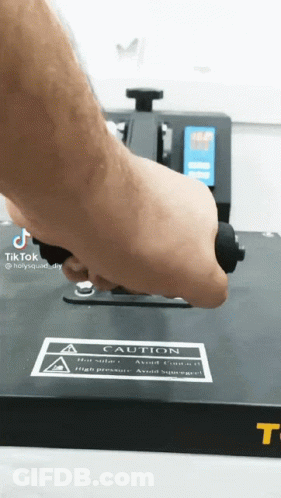 Person Using Machine With Caution Sign GIF