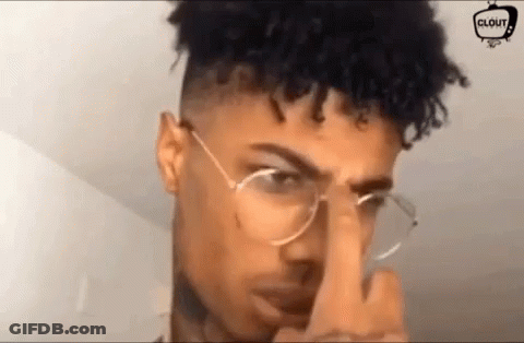 Person Walking Down Stairs Next To Blue Moon Sign GIF