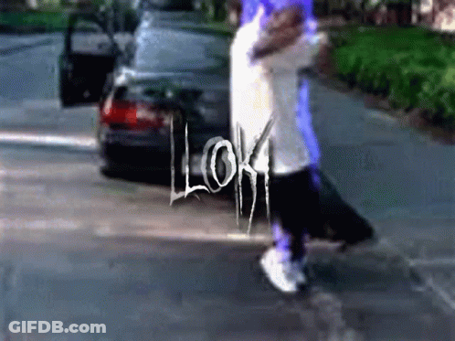 Person Walking Down Street Saying Loki GIF