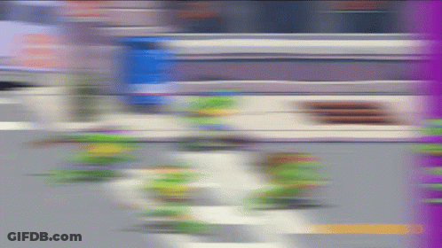Person Walking Down Street GIF