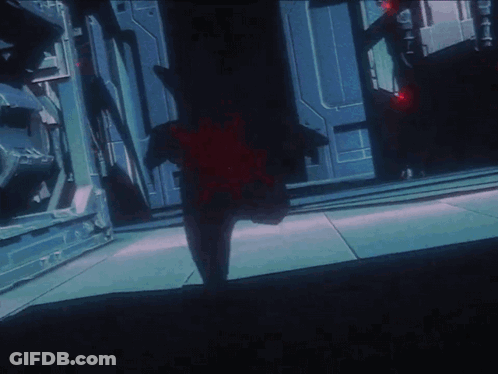 Person Walking In Dark Room With Red Star GIF