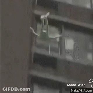 Person Walking In Front Of House GIF