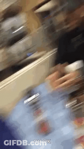 Person Walking In Room With Oh Ok GIF