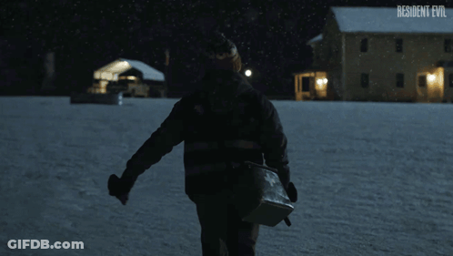 Person Walking In Snow Resident Evil GIF