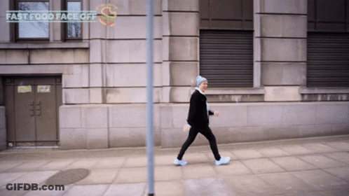 Person Walking Past Fast Food Face Off GIF