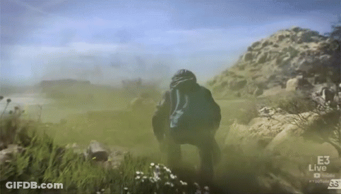 Person Walking Through Field With YouTube Logo GIF