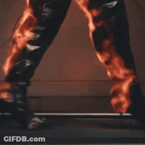 Person Walking Treadmill With Flames GIF