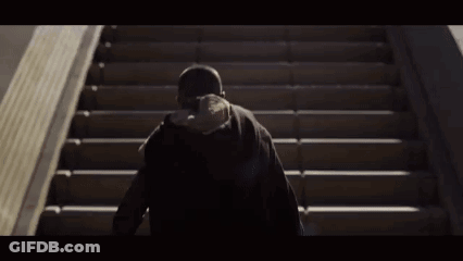Person Walking Up Stairs From Behind GIF