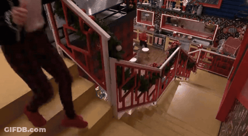 Person Walking Up Stairs In Kitchen GIF