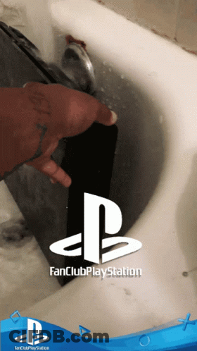 Person Washing PlayStation In Sink GIF