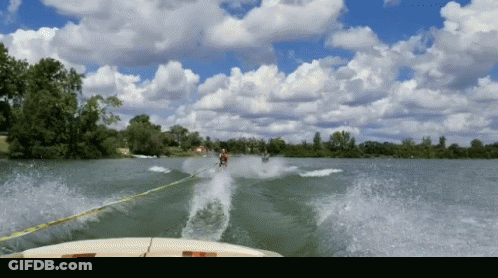 Person Water Skiing On Lake With Boat GIF