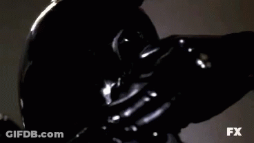 Person Wearing Black Mask And Gloves GIF