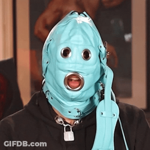 Person Wearing Blue Mask With Eye Holes GIF