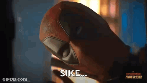 Person Wearing Deadpool Glove With Sike GIF