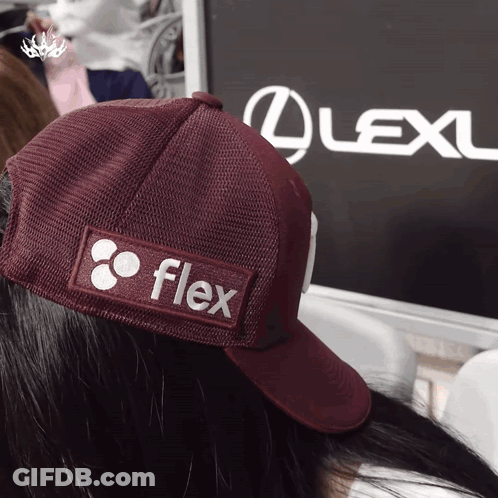 Person Wearing Flex Hat In Front Of Lexus Sign GIF