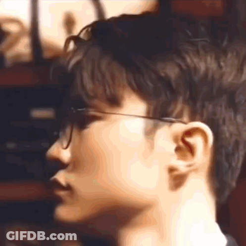 Person Wearing Glasses And Black Shirt GIF
