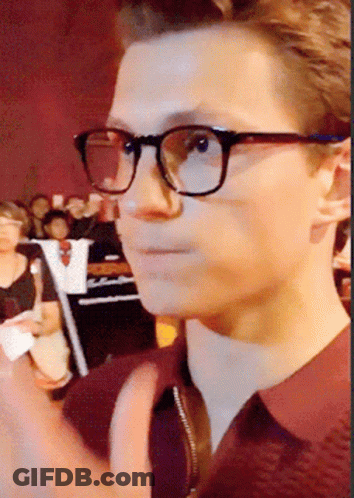 Person Wearing Glasses And Maroon Shirt GIF