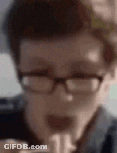 Person Wearing Glasses Eating Hamburger GIF