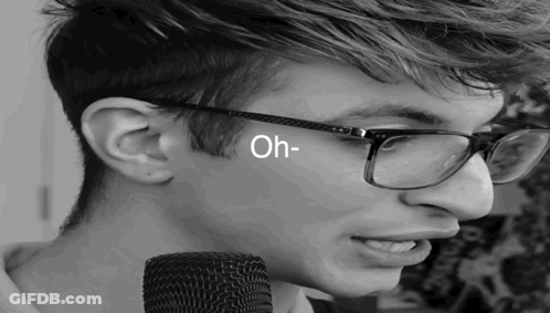 Person Wearing Glasses Saying Oh GIF