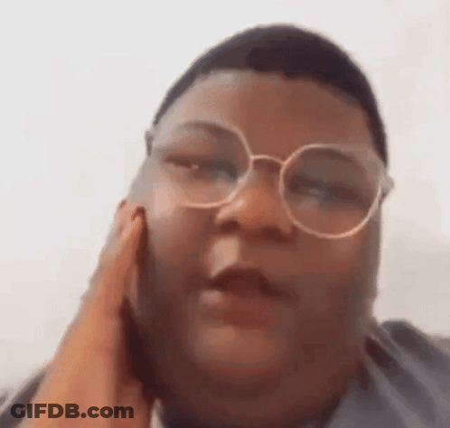 Person Wearing Glasses Talking On Cell Phone GIF