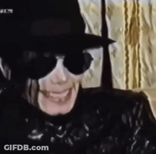 Person Wearing Hat And Sunglasses Smiling GIF