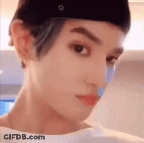 Person Wearing Hat Making Funny Face GIF