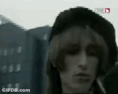 Person Wearing Hat Smoking Cigarette GIF