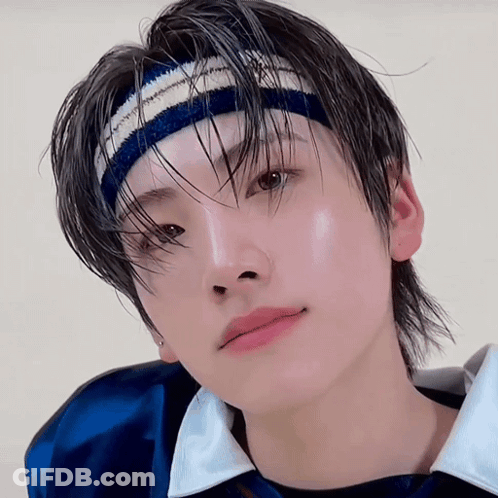 Person Wearing Headband And Blue Shirt GIF